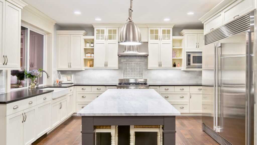 A beautifully renovated kitchen with newly installed cabinets.